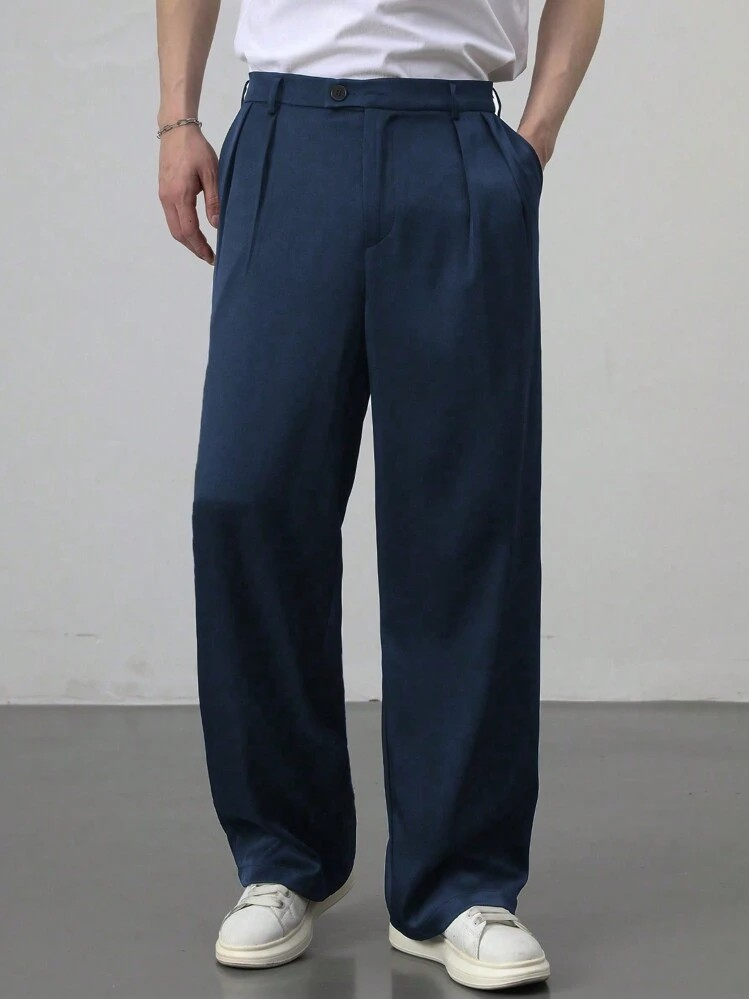 Pleated wide-leg trousers.