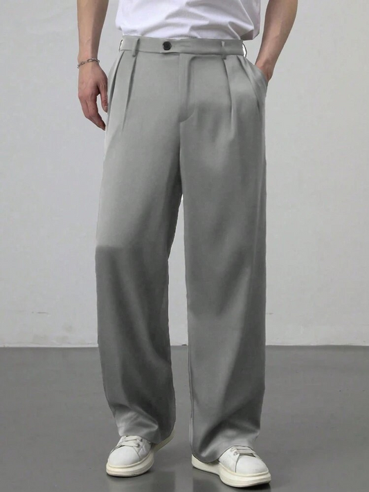 Pleated wide-leg trousers.