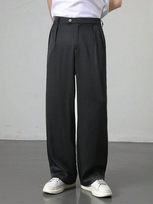 Pleated wide-leg trousers.